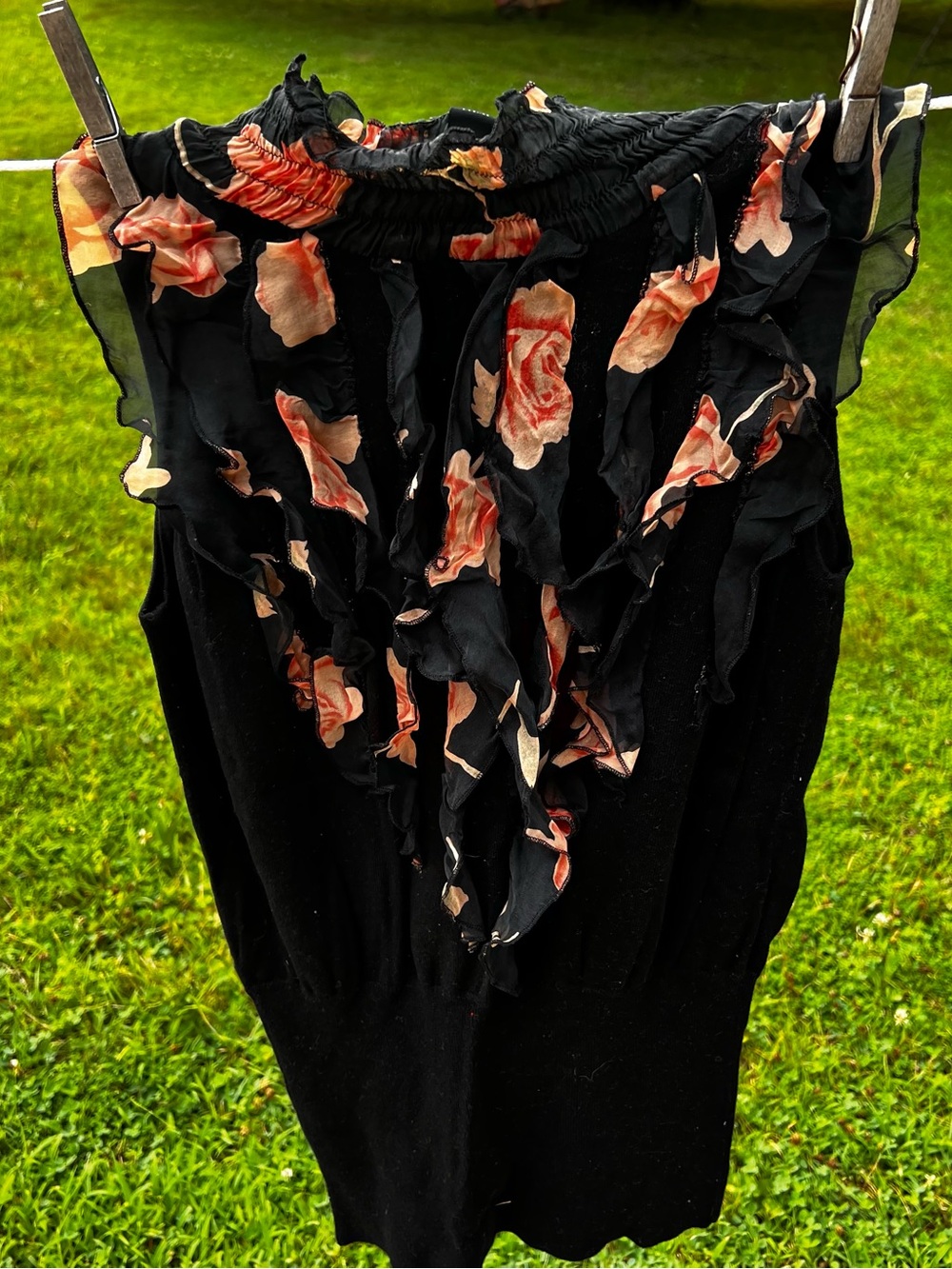 Black Sleeveless Top with Floral Ruffle mock neck Neckline